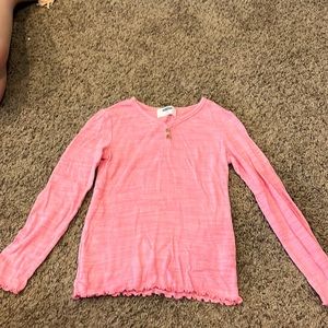 stretch and soft and ruffled at the sleeves and bottom